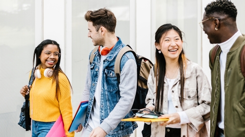 High school students walking between class